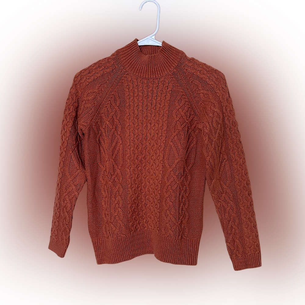 A sweater from PRESWICK MOORE.
